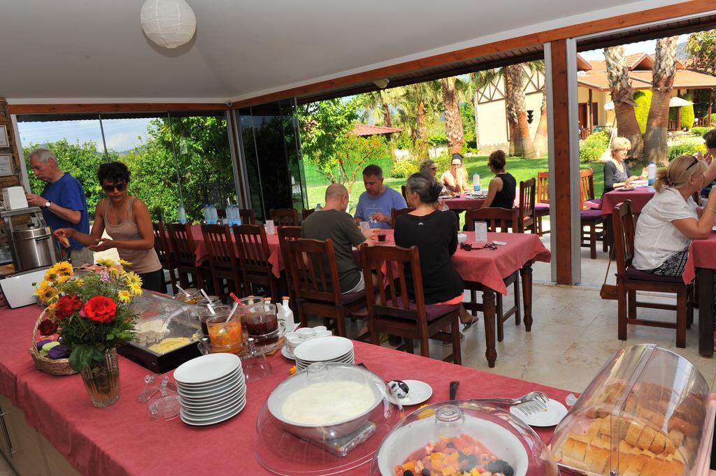 Grenadine Lodge Далян Екстериор снимка